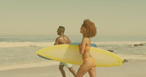 Couple Walking with Surfboards on Sunny Beach Vacation - Download Free Stock Images Pikwizard.com
