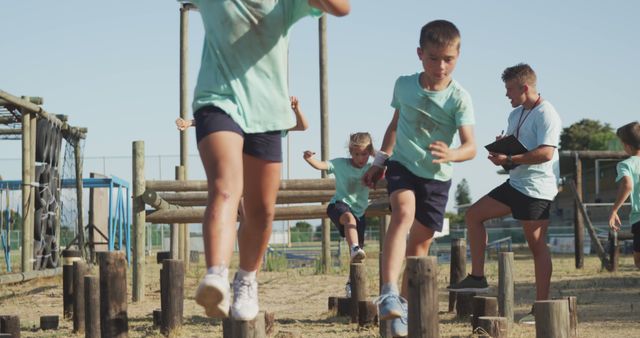 Kids during Outdoor Physical Training on Obstacle Course - Download Free Stock Images Pikwizard.com