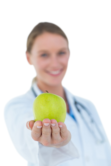 Smiling Doctor Offering Green Apple on Transparent Background - Download Free Stock Videos Pikwizard.com