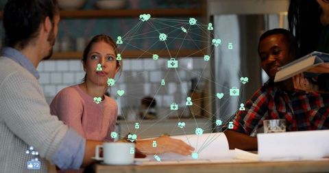 Team Collaboration in Modern Setting with Health Icons Overlay