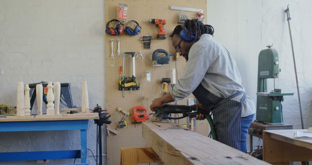 Focused Carpenter Working with Electric Saw in Workshop - Download Free Stock Images Pikwizard.com