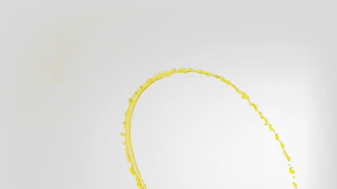 Abstract Yellow Paint Splash Against Pale Background