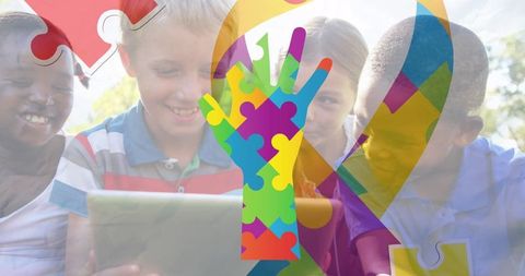 Children Using Tablet with Puzzle Themed Autism Awareness Overlay - Download Free Stock Images Pikwizard.com