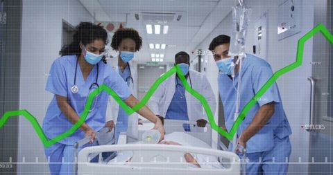 Medical Team Racing in Hospital with Patient on Stretcher in Emergency