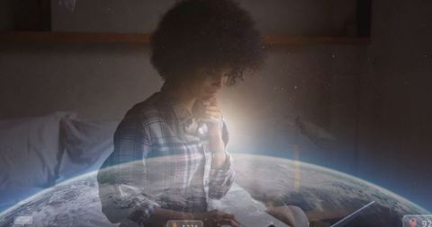 Technology immersion: woman engaging with holographic earth