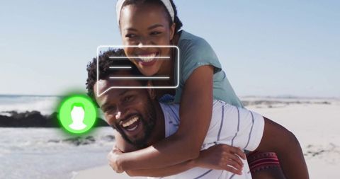 Joyful Couple Enjoying Piggyback Ride on Sunny Beach Day