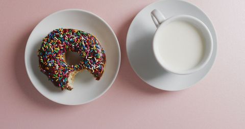 Colorful Sprinkle Donut and Milk on Pink Surface - Download Free Stock Images Pikwizard.com