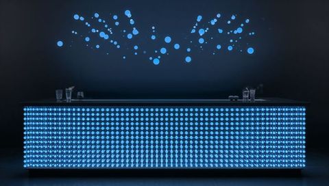 Blue LED Grid Bar Front Glowing Neon Counter Reflecting on Dark Minimalist Lounge