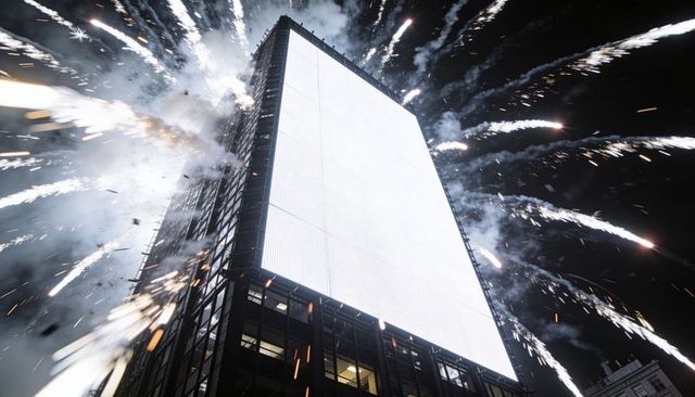 Blank Vertical LED Billboard Towering Over Metropolis Night with Exploding Fireworks Burst