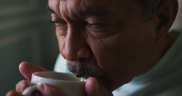 Elderly Man Enjoying Hot Beverage Close-up - Download Free Stock Images Pikwizard.com