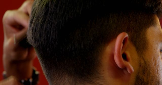 Close-Up of a Barber Cutting Hair with Clippers - Download Free Stock Images Pikwizard.com