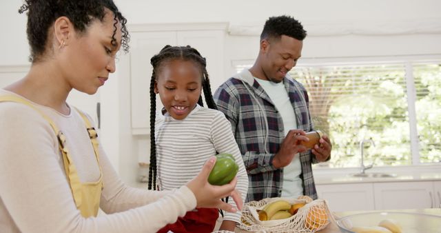 Happy African American Family Preparing Fresh Fruits in Kitchen - Download Free Stock Images Pikwizard.com