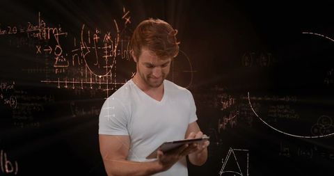 Young Man Using Tablet Surrounded by Floating Math Equations - Download Free Stock Images Pikwizard.com