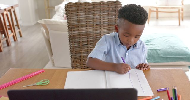 Young Child Drawing at Home, Focused and Engaged - Download Free Stock Images Pikwizard.com