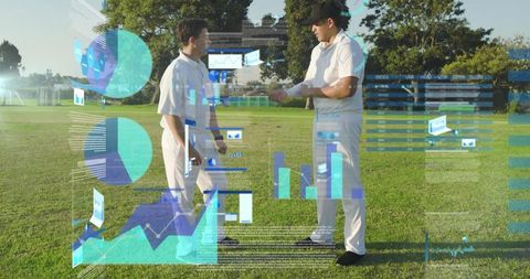 Cricketers shaking hands wearing white kit with augmented reality performance charts