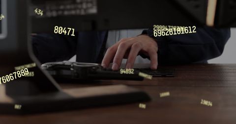 Floating Numbers Near Businessman Typing on Keyboard Driven by Technology