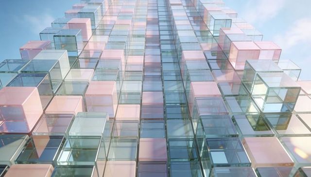 Rising glass cube facade creating converging geometric grid in pastel tones