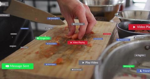 Chef handling chopped tomatoes on cutting board with augmented reality ui overlays