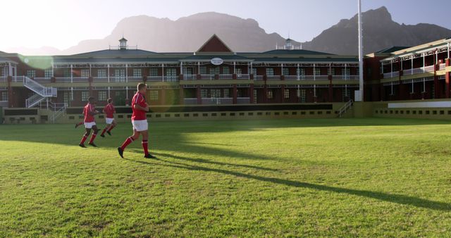 Youth Soccer Team Practicing on School Field with Scenic Mountain Background - Download Free Stock Images Pikwizard.com