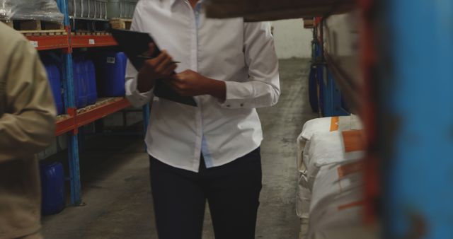 Worker Conducting Inventory in Industrial Warehouse - Download Free Stock Images Pikwizard.com