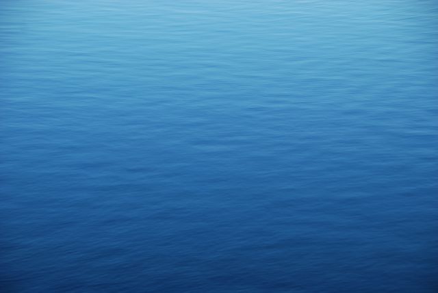 Calm Blue Ocean Surface on a Serene Day - Download Free Stock Photos Pikwizard.com