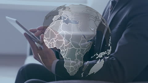 Businessman with Digital Tablet and Overlay of Global Map