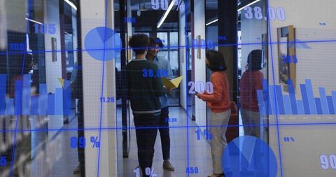 Team discussing in glass corridor with blue data overlay, yellow paper plane and folder