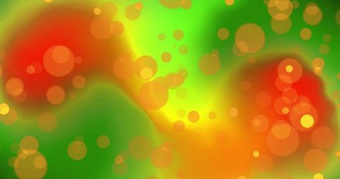 Vibrant glowing orange spots on abstract green background