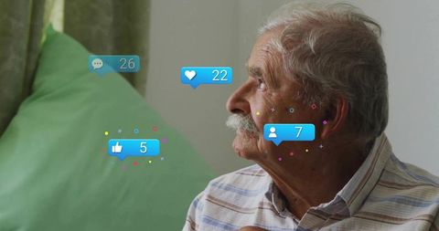 Senior Man Engaging with Social Media at Home