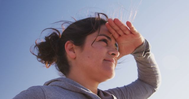 Woman Gazing into Distance on Bright Sunny Day - Download Free Stock Images Pikwizard.com