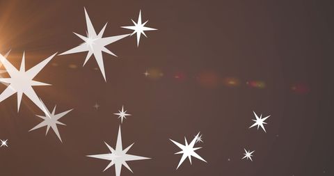Glowing Stars on Warm Brown Background for Festive Celebrations - Download Free Stock Images Pikwizard.com