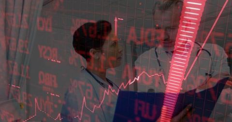Healthcare Professionals Analyzing Data with Red Financial Charts Overlay