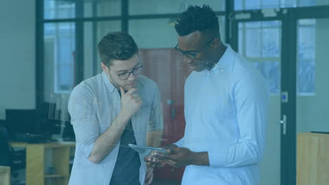 Business Professionals Analyzing Digital Data on Tablet