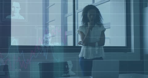 Woman in Office Analyzing Digital Data with Graphic Overlays