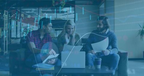 Young professionals collaborating in office lounge