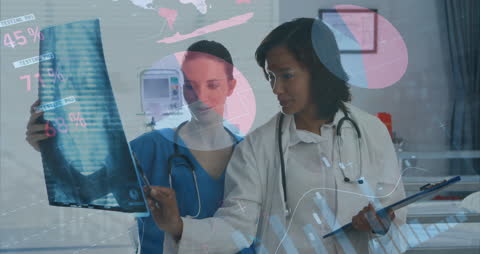 Doctors Analyzing X-Ray with Digital Data Overlay