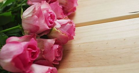 Pink Roses Bouquet on Wooden Table - Symbol of Love and Celebration - Download Free Stock Images Pikwizard.com