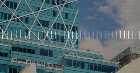 Modern glass tower with diagonal lattice, curtainwall windows and rooftop terraces