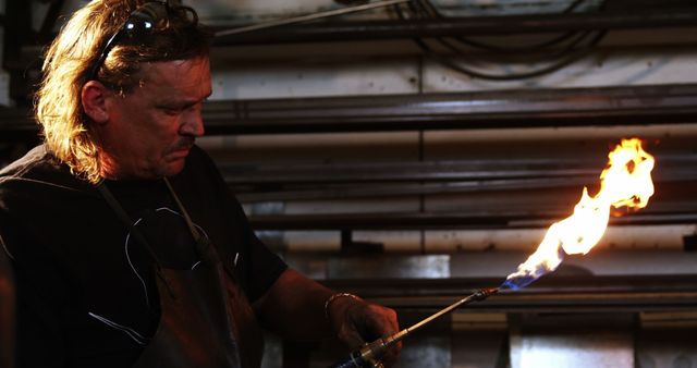 Metalworker Using Blow Torch in Workshop - Download Free Stock Images Pikwizard.com