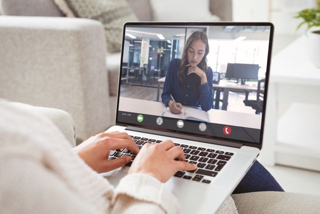 Ideal for illustrating remote work situations, virtual meetings, teamwork across distances, modern business solutions, and home office setups. Useful for blogs, articles, or service advertisements involving video communications and telecommuting.