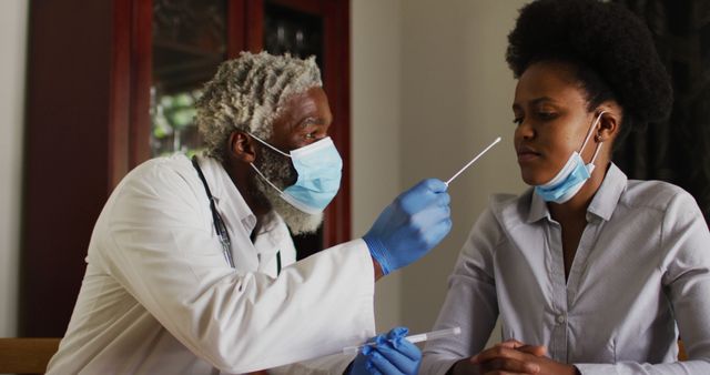 Elderly doctor performing nasal swab test on young female patient in clinical setting. Both individuals are wearing protective masks and gloves, emphasizing safety and hygiene. This image can be used for articles, blogs, or informational materials about COVID-19 testing, healthcare practices, pandemic response, medical examinations, and doctor-patient interactions.