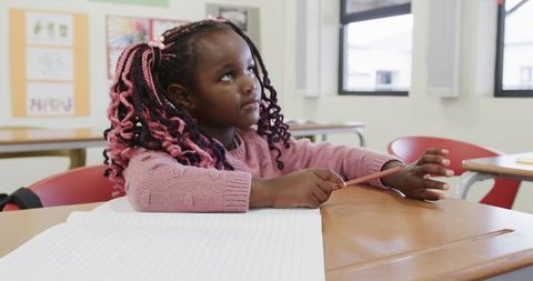 Young Girl Engaged in Classroom Activity