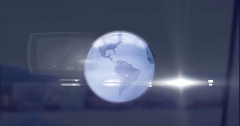 Glowing digital globe with american continents and futuristic display