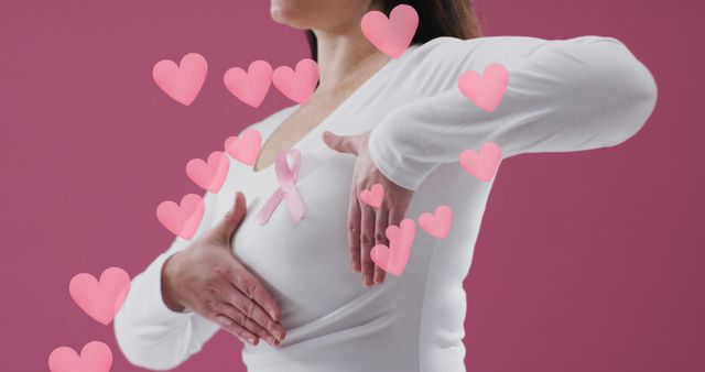 Breast Cancer Awareness Woman Checking Breast with Pink Hearts - Download Free Stock Images Pikwizard.com