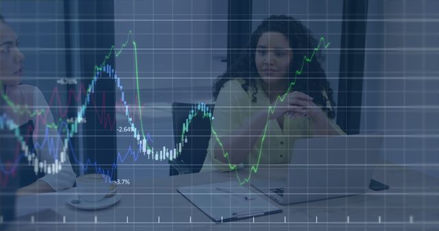 Businesswoman Analyzing Financial Data Graphs on Laptop in Office - Download Free Stock Images Pikwizard.com