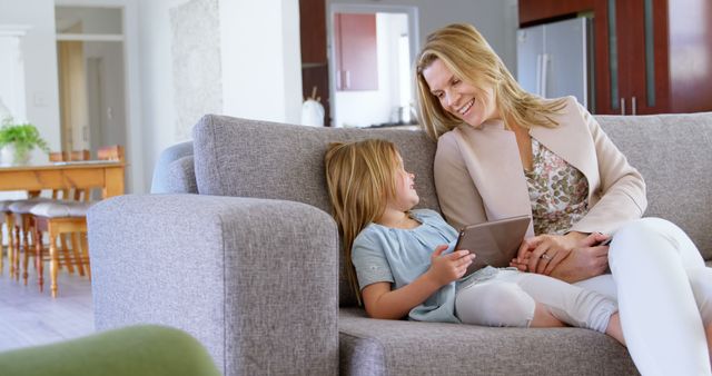 Mother and Daughter Sharing a Moment at Home on Cozy Couch - Download Free Stock Images Pikwizard.com