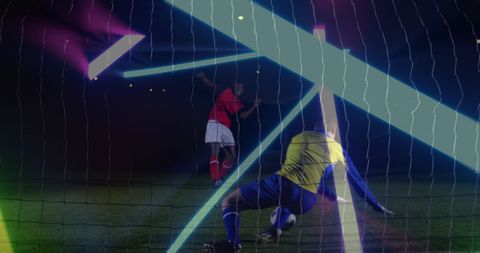 Neon Lights Capturing Intense Soccer Moment