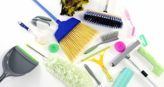 Variety of Colorful Cleaning Supplies Arranged on White Background - Download Free Stock Images Pikwizard.com