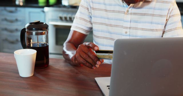 Man Shopping Online Using Laptop and Credit Card at Home with Coffee - Download Free Stock Images Pikwizard.com