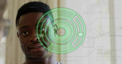 Young man facing camera interacting with biometric hud overlay for ar authentication